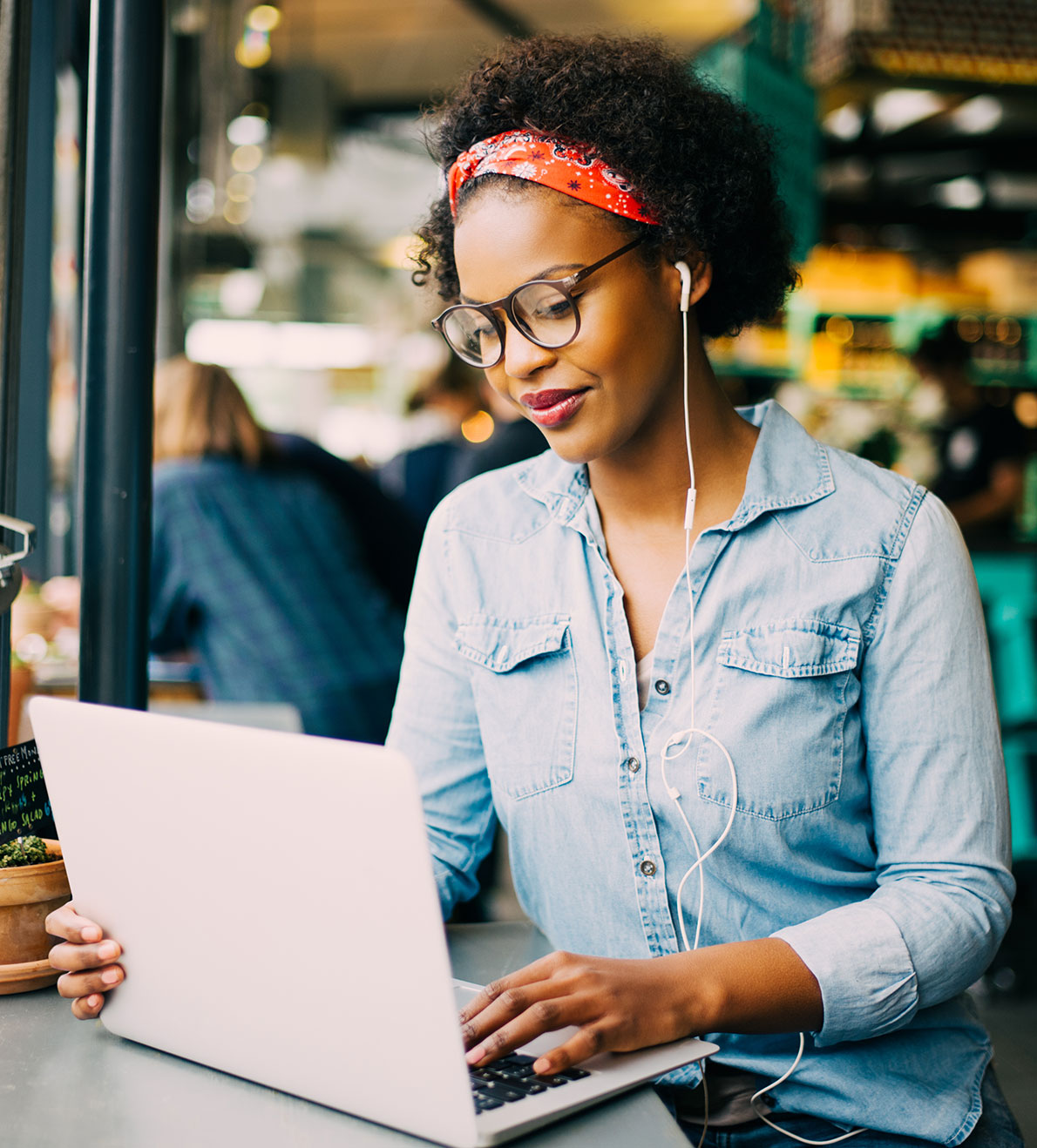 Woman in coffee shop on computer 2